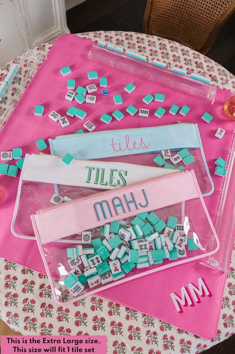 a table topped with lots of pink and blue items