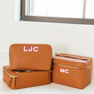Custodia da treno in pelle Shadow Monogram