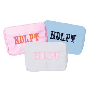 three bags with the same design and color, each with the text "NDLPT" printed on them.