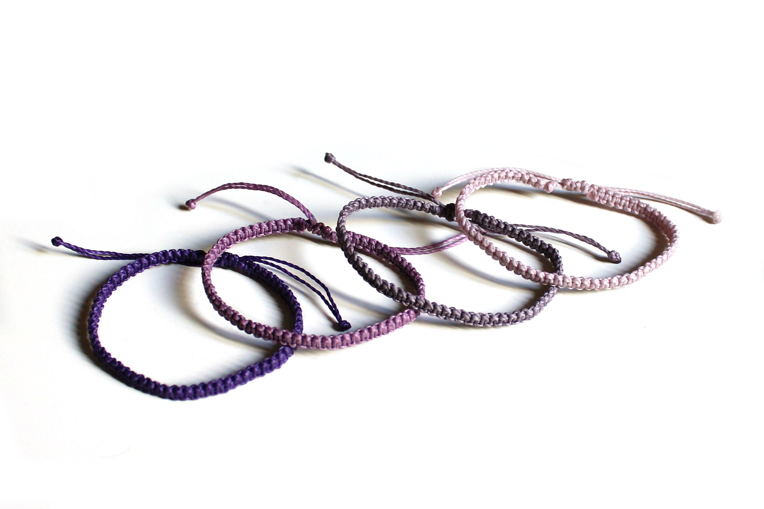 Purple string best sale bracelet