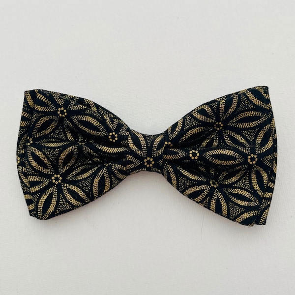 large gold bow tie