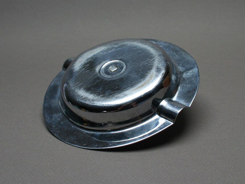 Unusual smoker gift idea Featuring a muscular arm and a dumbbell Vintage 1930s Antique advertising chrome ashtray