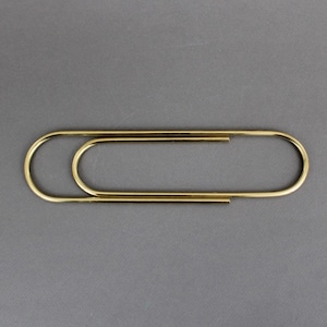 Vintage CARL AUBOCK koperen sculptuur uit de jaren 50, gigantische paperclip presse-papier, gemaakt in Oostenrijk