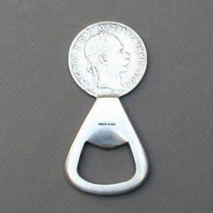 Vintage CARL AUBOCK flesopener jaren 50, decor barwagen, gemaakt in Oostenrijk
