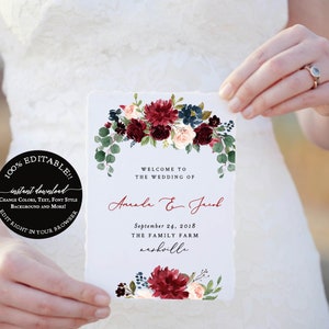 May include: A white wedding welcome sign with a floral design in burgundy, navy, and blush tones. The sign reads "Welcome to the Wedding of" followed by names and the wedding date, September 24, 2018, and location, The Family Farm, Nashville.