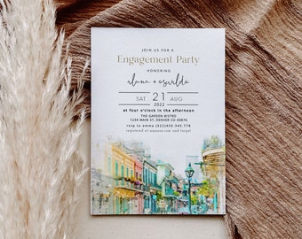 May include: A white invitation card with green text announcing an engagement party for Alana and Osvaldo. The party will be held on Saturday, August 21, 2022 at 4:00 PM at The Garden Bistro, located at 1234 Main St, Denver CO 09876. The RSVP information is provided, along with the registry information. The background of the card features a watercolor painting of a street scene.