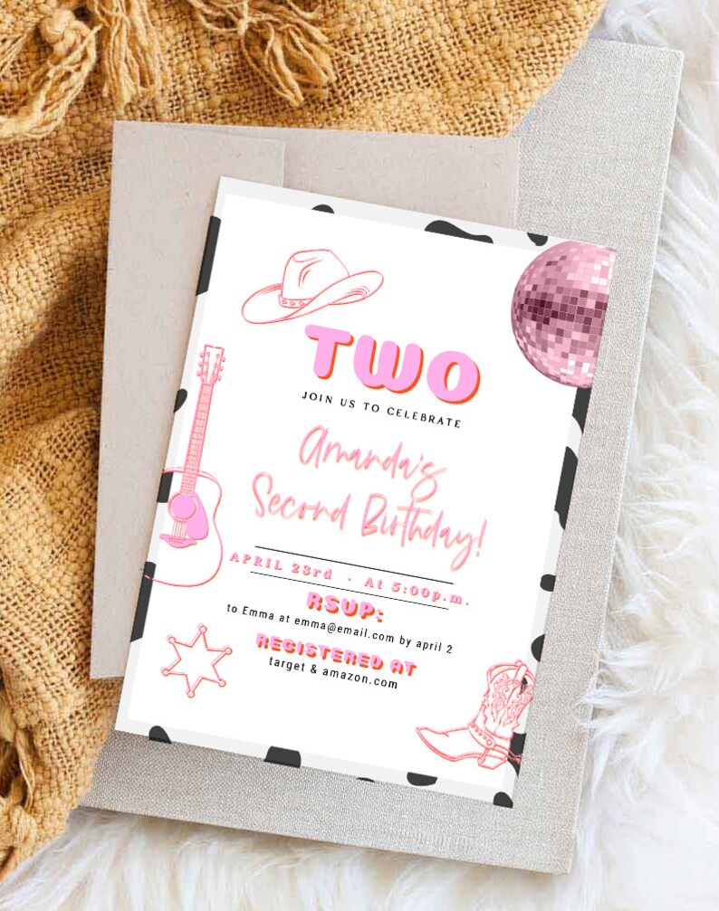 May include: A pink and white birthday invitation with a cow print background. The invitation says "Two" in pink letters with a pink and white cowboy hat, a pink disco ball, a pink guitar, and a pink cowboy boot. The text says "Join us to celebrate Amarda's Second Birthday! April 23rd at 5:00p.m. RSVP to Emma at emma@email.com by April 2. Registered at target & amazon.com"