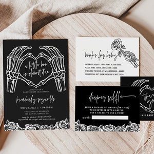 May include: Black and white baby shower invitation with a skeleton hand heart design. The invitation reads "Little Boo is almost due" and includes the date and time of the shower. There are also cards for a diaper raffle and a book request.