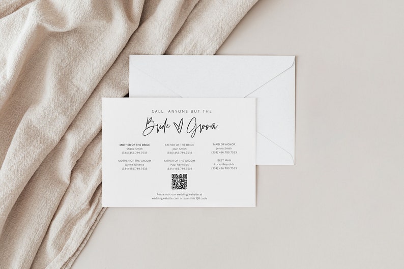 May include: A white card with black text that reads "Call anyone but the Bride & Groom". The card lists the names and phone numbers of the bride and groom's family members, including the mother of the bride, father of the bride, mother of the groom, father of the groom, maid of honour, and best man. A QR code is also included on the card.