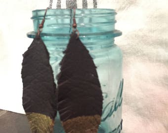 Leather feathered earrings with gold detail