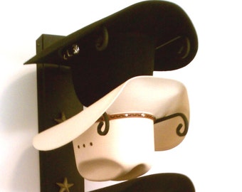 Porte-chapeau de cowboy noir avec étoiles dorées 665 B/G