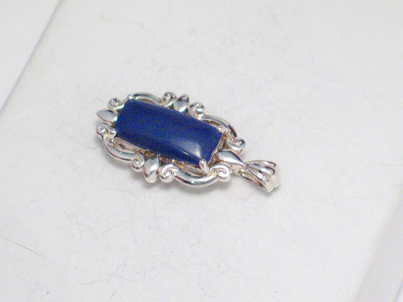 Sterling Silver pendant blue stone charm rectangle ornate framework fluted bale art 27.93 mm long womens fine jewelry