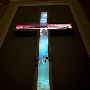 Lighted Nautical Cross with Interchangeable Scriptures, Showcasing a Backlit Art Graphic of Jesus Walking on Water.