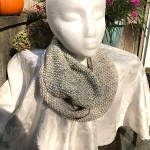 Hand knitted scarf. Soft cotton yarn can be worn long or wrapped around your neck.