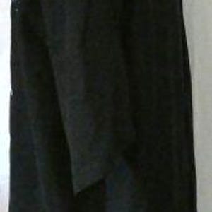 May include: A black overcoat with a notched collar and three-quarter sleeves. The coat is long, reaching below the knees, and has a single vent in the back. The fabric appears to be a medium-weight material, suitable for cooler weather.