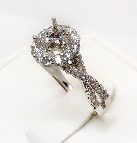 14k White Gold 6mm Round Halo Twist Semi-Mount Engagement Ring and Band Set 14k White Gold 6mm Round Halo Twist Semi-Mount Engagement Ring and Band Set
