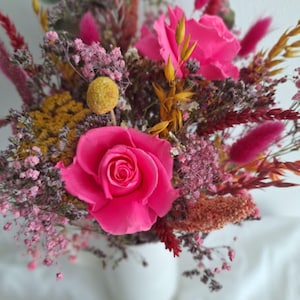 A joyful bouquet of dried and preserved flowers in colorful composition– lovingly handcrafted with lasting beauty.