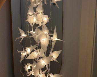 Kerstverlichting origami kraanvogels transparant