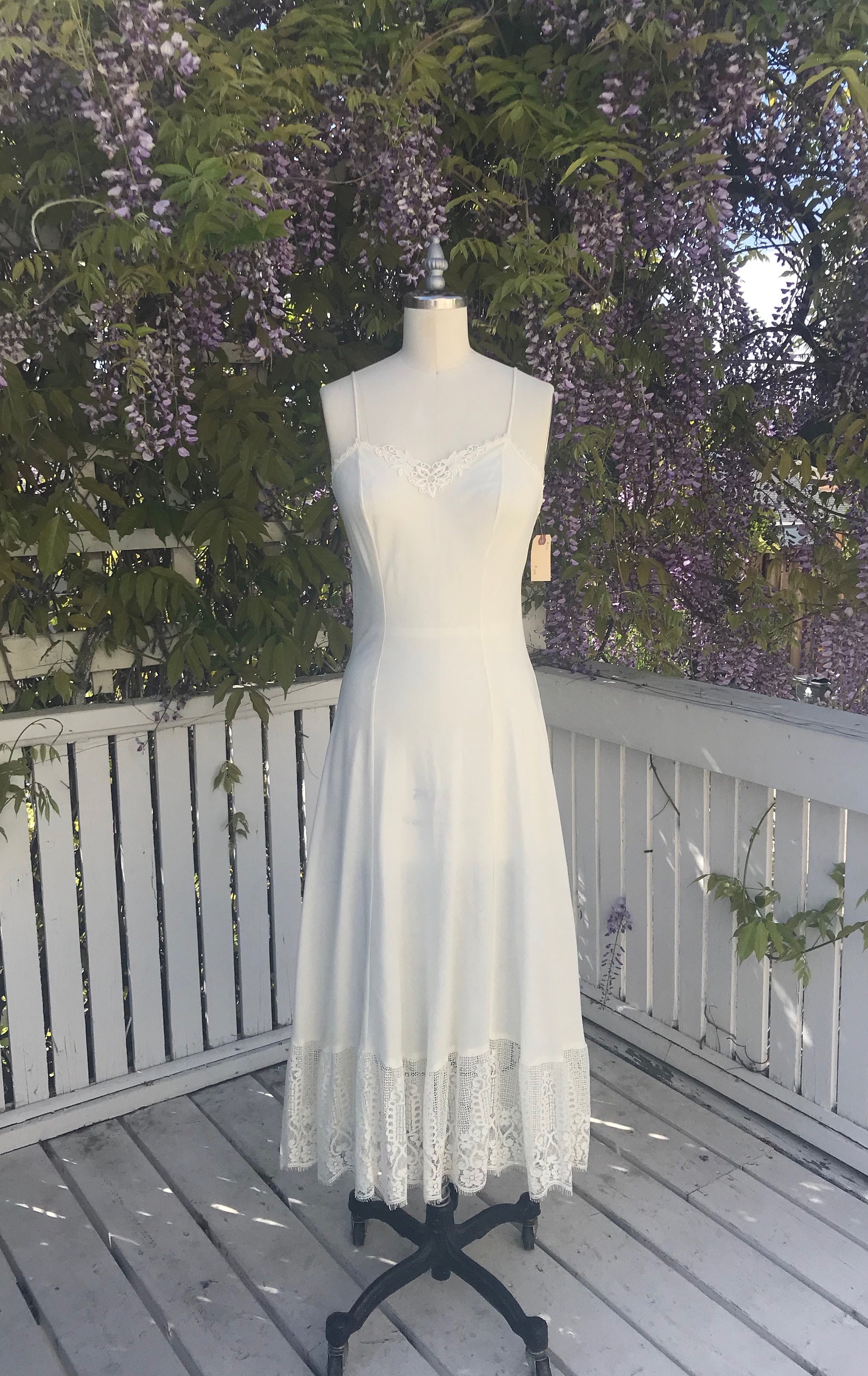 Royale bias-cut brown slip dress with flounce hem