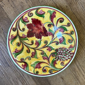 Italian Ceramic Bowl, 11.5 inches wide with grape leaf design in Yellow, Rust, and Green