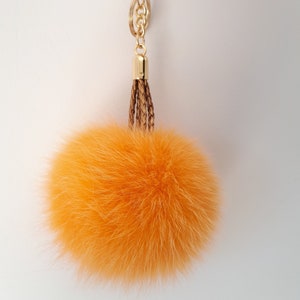 Portachiavi con pompon di volpe arancione e cinturino in finta pelle. Ciondolo per borsa in pelliccia di volpe. Portachiavi in pelliccia.