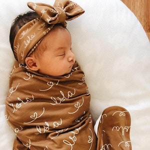 Personalized swaddle blanket and bow 2025