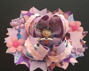 Doc McStuffins boutique hairbow with an attached barrette on the back