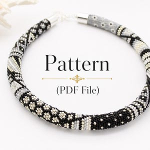 May include: A circular beaded necklace featuring a complex geometric pattern in black, white, and grey tones. The text Pattern (PDF File) is centred within the necklace. The piece is finished with silver-toned metal end caps and a clasp.