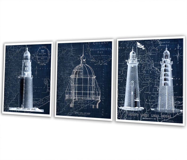 May include: Set of three vintage blueprint style prints of lighthouses. Each print features a different lighthouse design with a map background. The prints are in shades of blue and white.