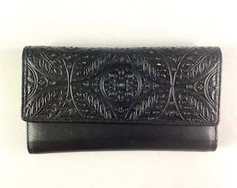 NWOT-Rolf’s-“ necessities” black, embossed, leather trifold wallet