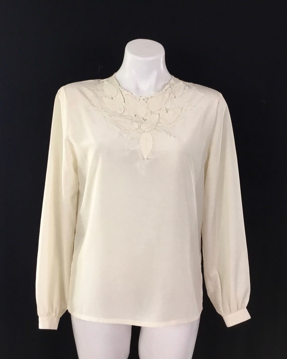 Anne French cream blouse