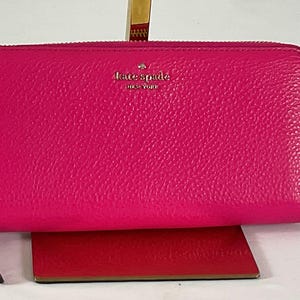 NWOT-Kate Spade, New York Roulette zip around Continental wallet