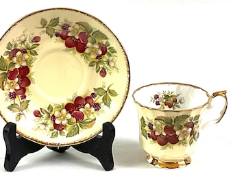 Elizabethan Staffordshire, hand decorated, fine bone china-tea cup and saucer, England