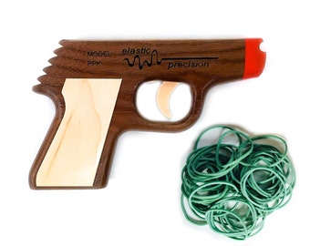 Pistola de goma elástica modelo PPK - Nogal