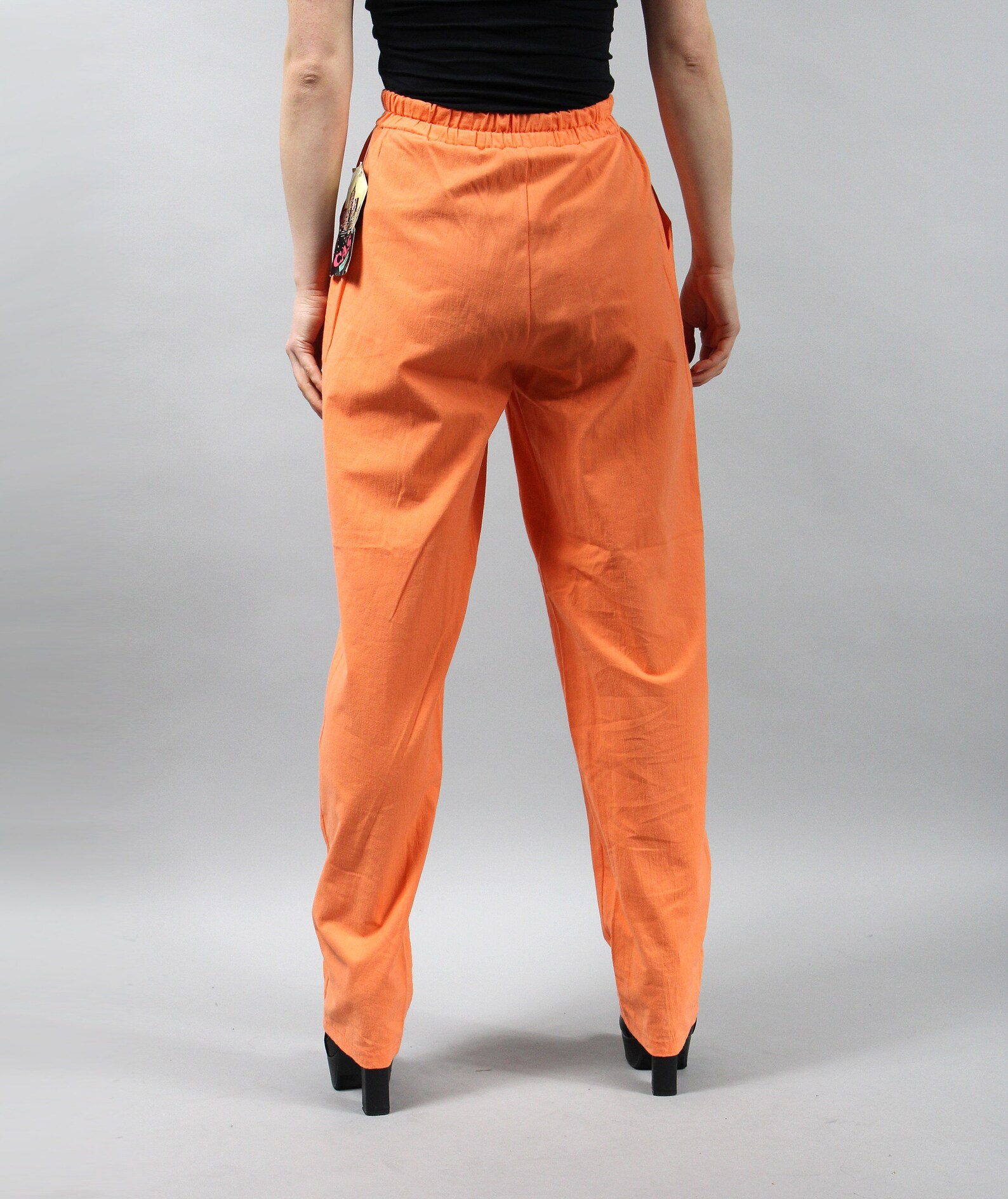 neon orange baggy pants