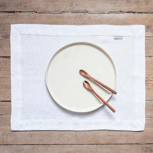 White linen placemat. Linen placemat. Solid placemat made of heavy linen
