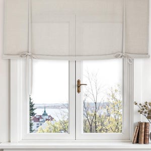 Linen tie up curtain. Tie up blind made of linen. Window shades