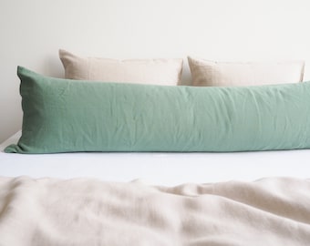 Linen body pillow pillowcase in eucalyptus green. Pillowcase for a long pillow made from 100% stonewashed linen.