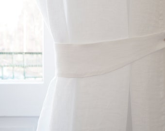 White curtain tie back made of stonewashed medium linen (160 g/2). linen curtain hold-back.