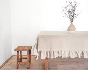 Farmhouse-style ruffled linen tablecloth. Stonewashed European linen