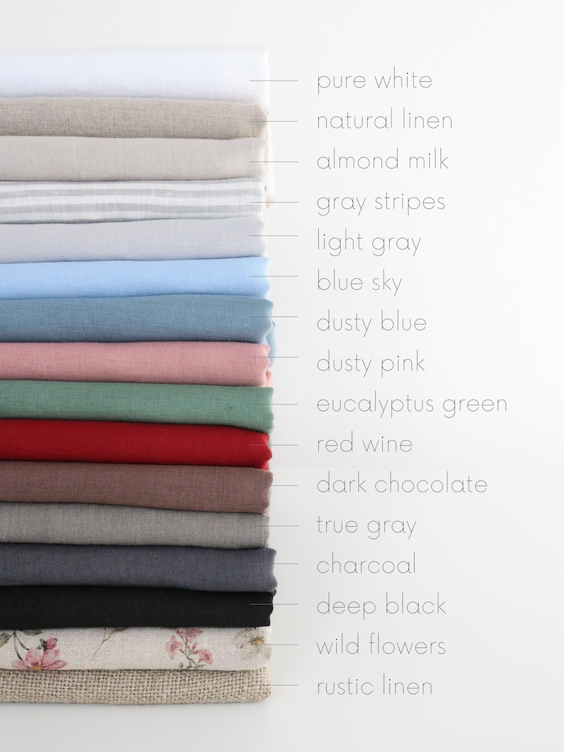 May include: A stack of 16 fabric swatches in various colours and patterns, including pure white, natural linen, almond milk, grey stripes, light grey, blue sky, dusty blue, dusty pink, eucalyptus green, red wine, dark chocolate, true grey, charcoal, deep black, wild flowers, and rustic linen.