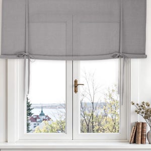 Heavy linen tie up curtain. Tie up blind made of linen. Window shades
