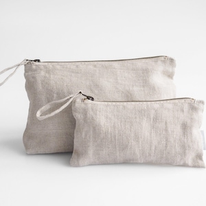 Trousse de maquillage minimaliste en lin. Trousse de maquillage en lin durable de couleur lin naturel.