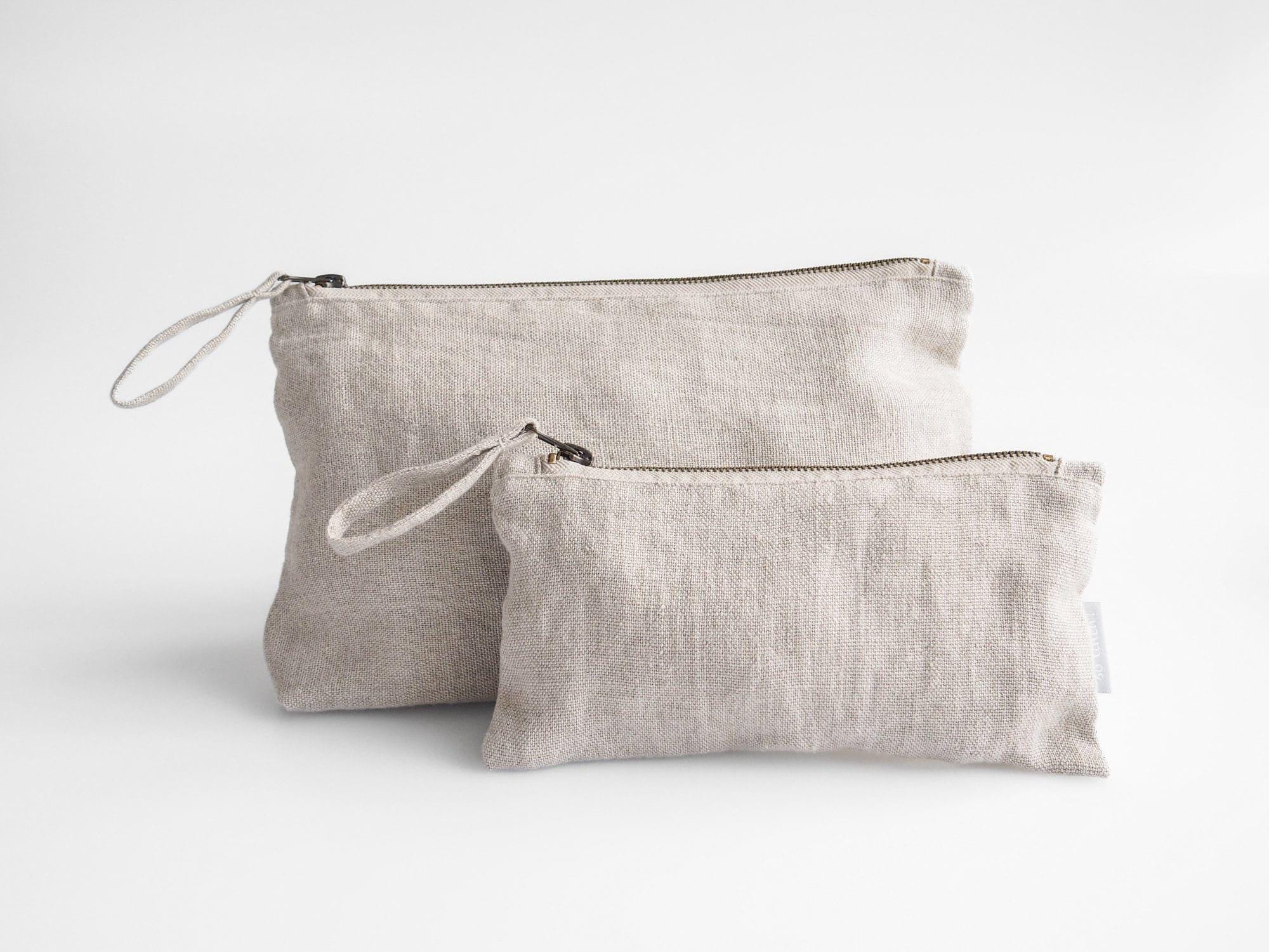 Minimalist linen makeup bag. sustainable linen makeup pouch in natural linen color.