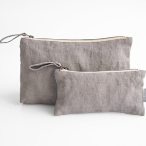 Linen makeup organizer. linen pouch with a zipper in true gray color.