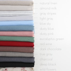 May include: A stack of 16 fabric swatches in various colors and patterns, including pure white, natural linen, almond milk, gray stripes, light gray, blue sky, dusty blue, dusty pink, eucalyptus green, red wine, dark chocolate, true gray, charcoal, deep black, wild flowers, and rustic linen.