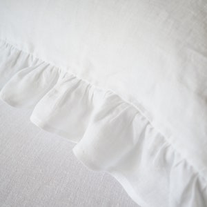 white linen pillowcase with a ruffle