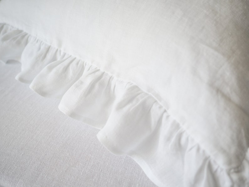 white linen pillowcase with a ruffle