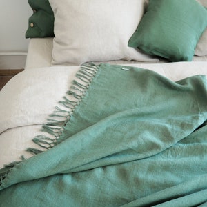 green linen bed throw