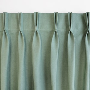 French pleat curtain. double pleat curtain made of heavy linen.